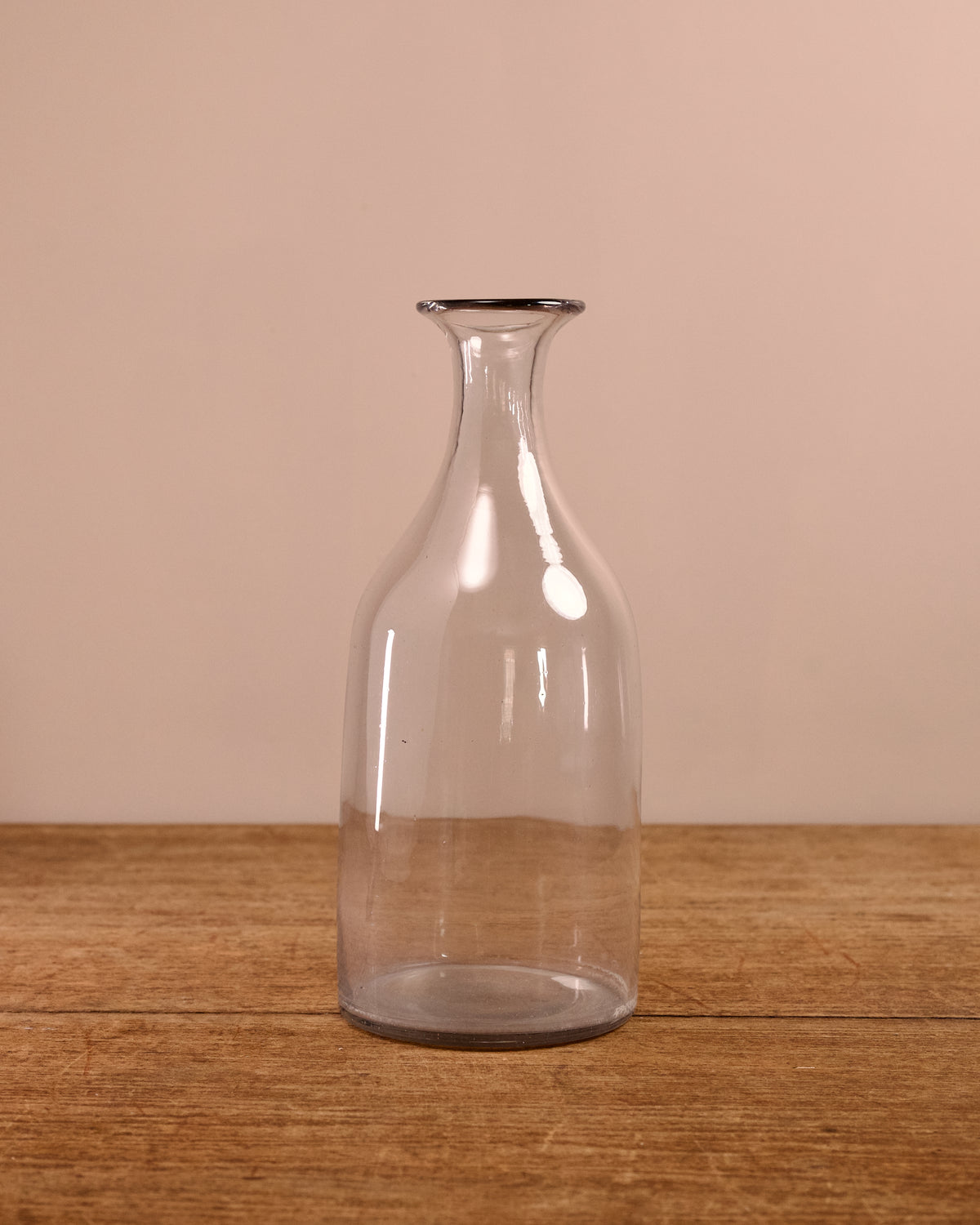 French Carafe on wooden table
