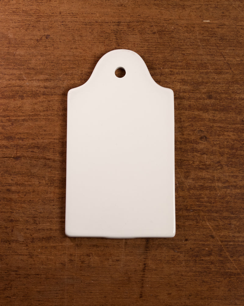 Porcelain Onion Board on a wooden surface